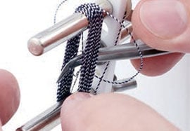 Pushing tweezers through the material